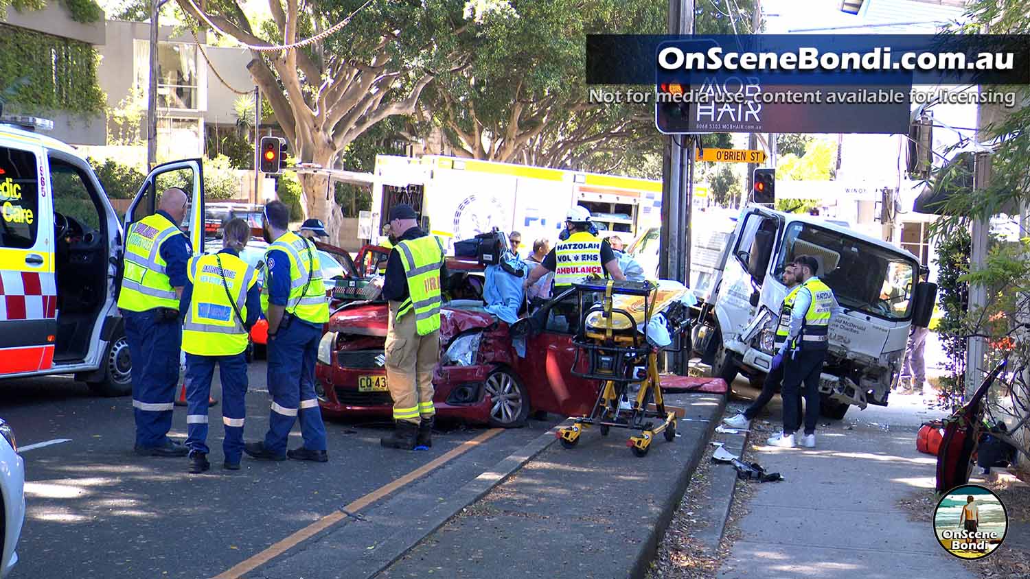 Woman trapped after car and truck crash in Bondi